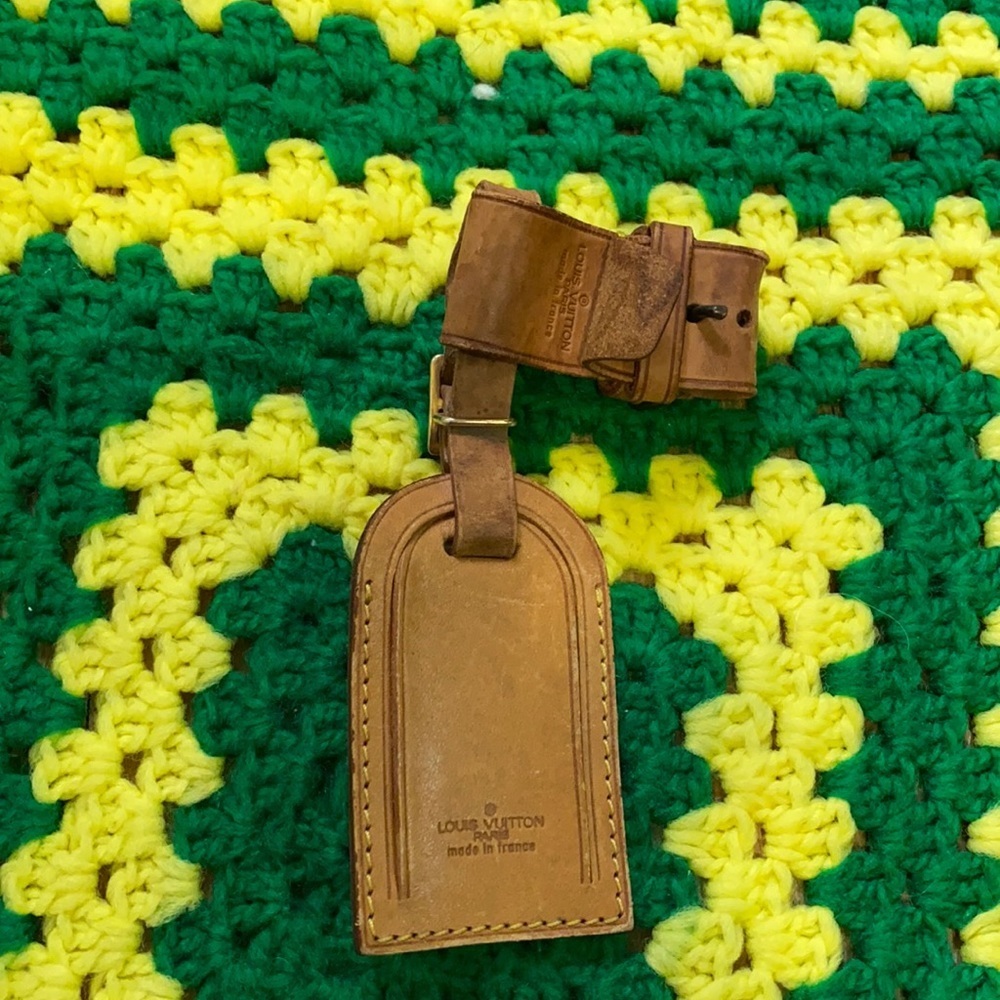 Louis Vuitton luggage tag and poignant
